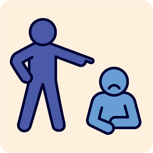 A person standing over someone who looks upset and pointing at them.