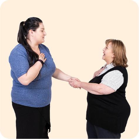 2 people shaking hands.