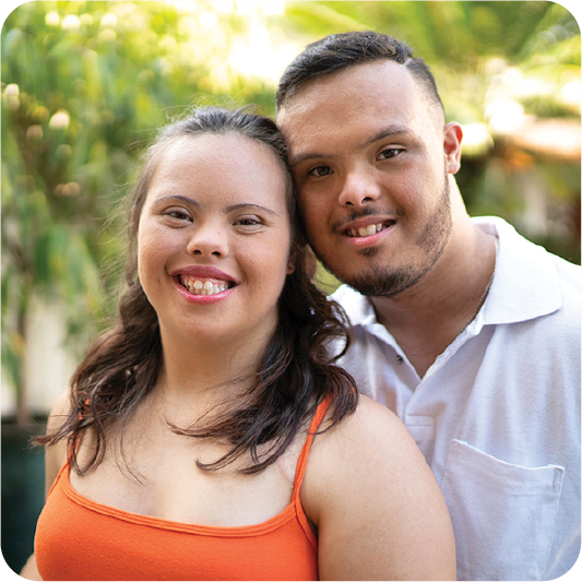 2 people smiling together.
